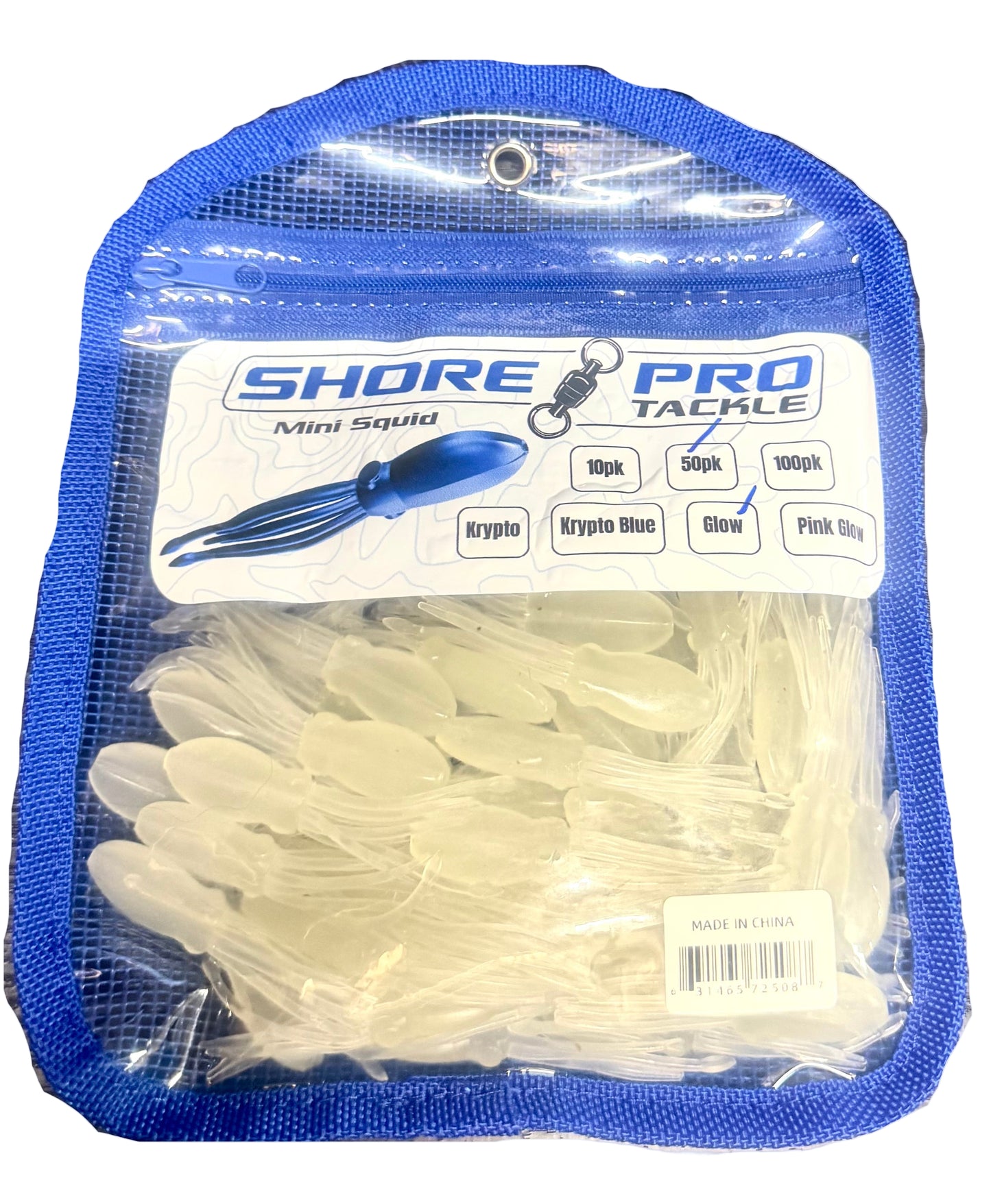 Packaged Shore Pro Tackle Mini Squid lures on a dark surface