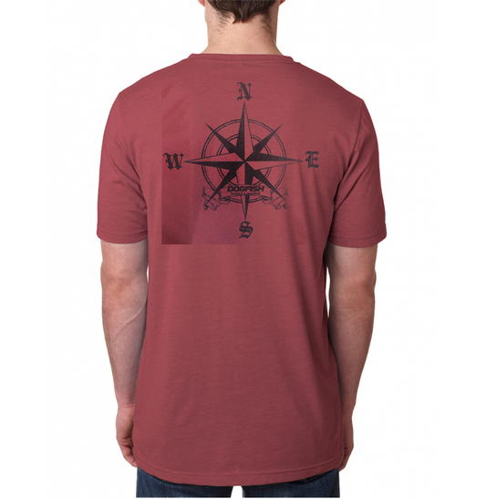 Maroon t-shirt with a compass design on the back, worn by a person.
