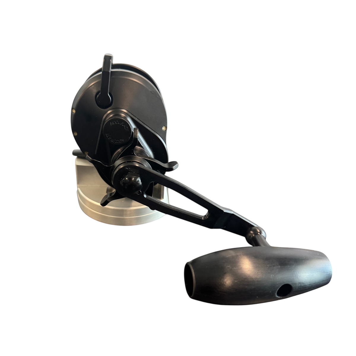 Dogfish Tackle & Marine Accurate Ascender star drag jigging reel in matte black with an ergonomic handle