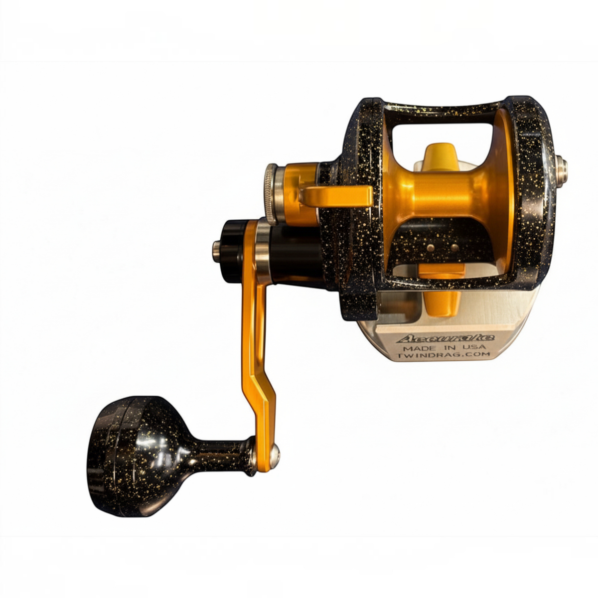 Dogfish Tackle & Marine Accurate Valiant 2 conventional fishing reel in black gold flake with a gold spool and handle.