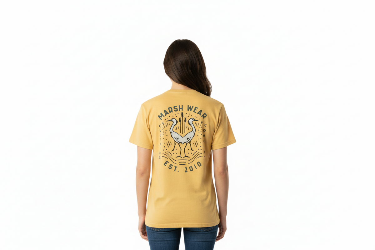 Dogfish Tackle & Marine Marsh Wear yellow cotton t-shirt with a back graphic of two herons in a circular design.