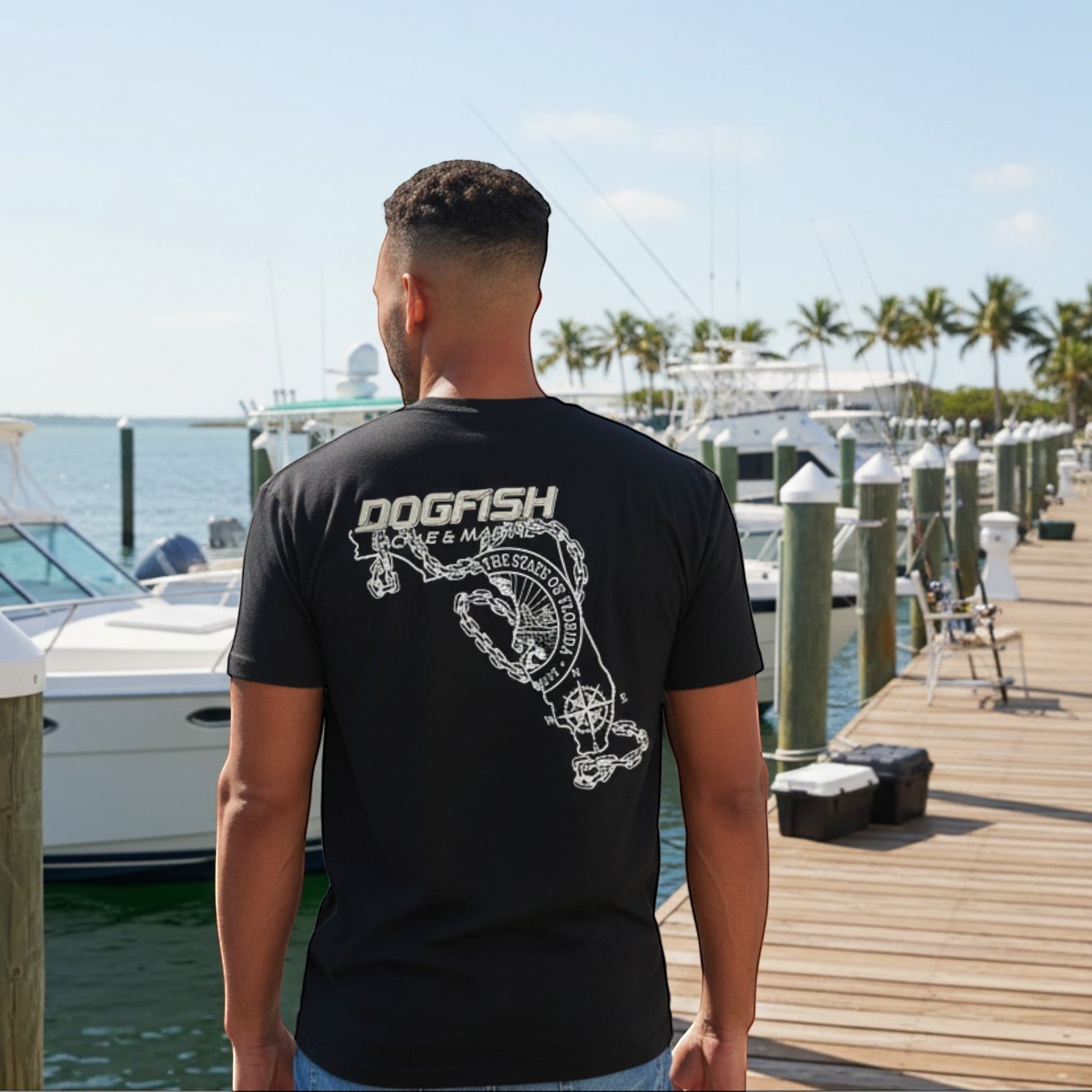 Dogfish Tackle & Marine black poly-cotton t-shirt with Florida Unchained logo on back. Crew neck, short sleeves.
