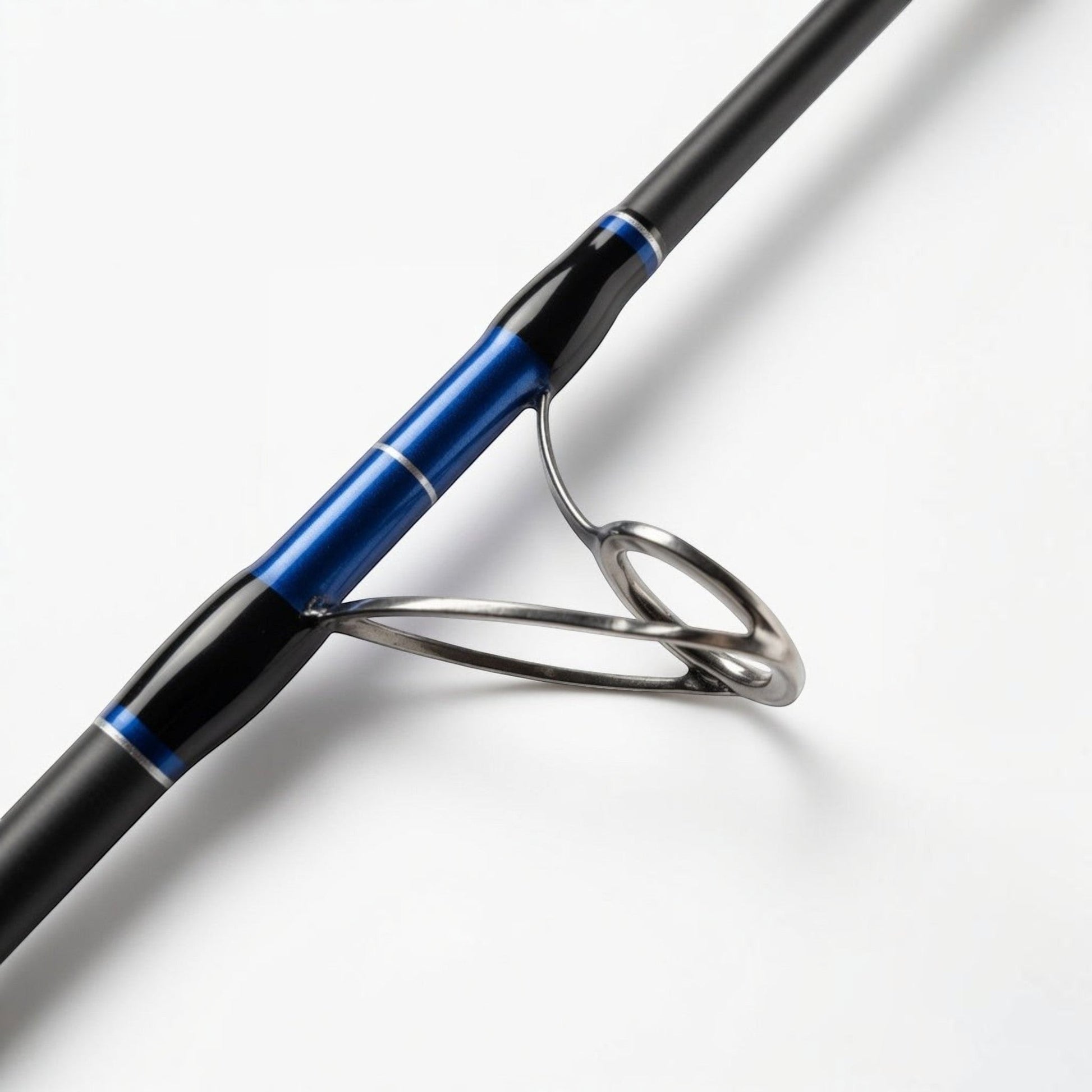 Dogfish Tackle & Marine blue and black graphite spinning fishing rod with silver guides and accents.