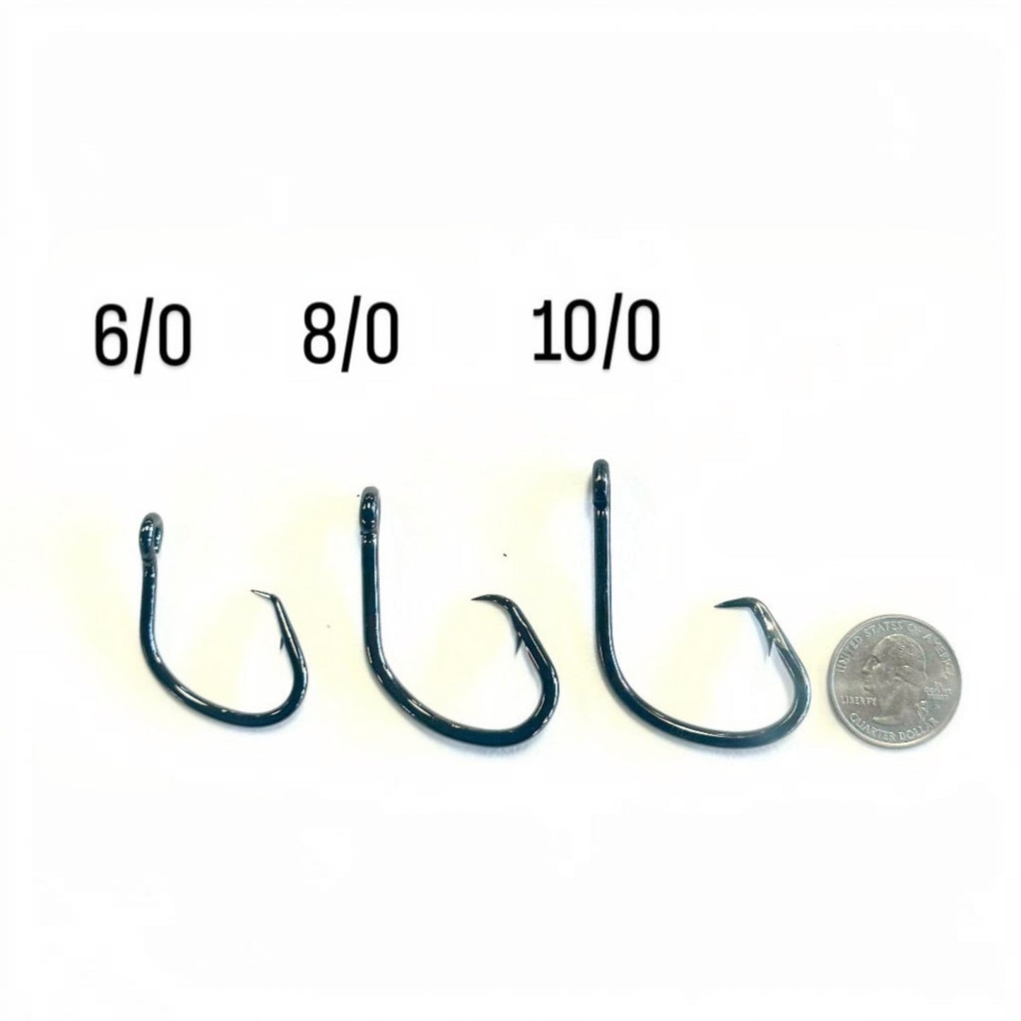 Dogfish Tackle & Marine deep drop fishing rigs shown in sizes 6/0, 8/0, and 10/0 with a quarter for scale.
