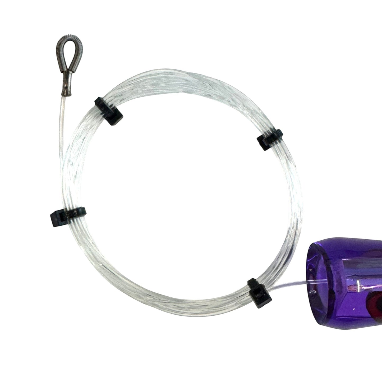 Dogfish Tackle & Marine pre-rigged Mutha Chugga trolling lure with clear monofilament line and purple chugger head