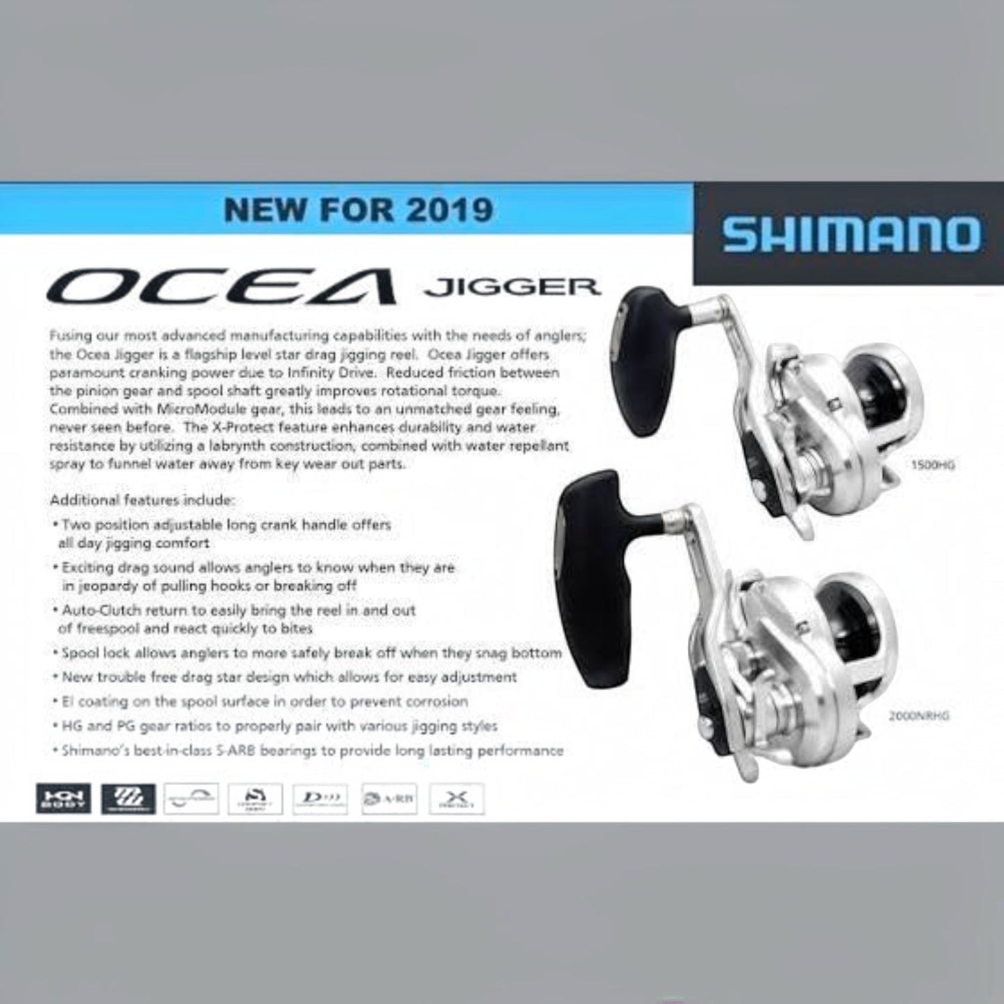 Shimano Ocea Jigger star drag conventional fishing reels in silver and black, featuring a long adjustable handle and compact aluminum frame.