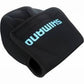 Dogfish Tackle & Marine black neoprene spinning reel cover with blue Shimano logo, offering impact protection.