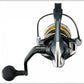 Dogfish Tackle & Marine Shimano 2025 Stella SW D spinning reel in dark gray and silver with gold accents and black handle.