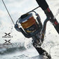 Dogfish Tackle & Marine Shimano 2025 Stella SW D spinning reel with gold spool, black body, and water splashing.