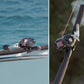 Dogfish Tackle & Marine Shimano Tekota level wind star drag conventional fishing reel, black with pink line, mounted on a fishing rod.