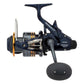 Dogfish Tackle & Marine Shimano Thunnus CI4 6000 spinning reel in dark blue with orange accents and a large black handle.