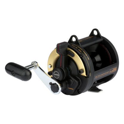 Dogfish Tackle & Marine Shimano TLD25 lever drag conventional fishing reel, black and gold with silver handle.