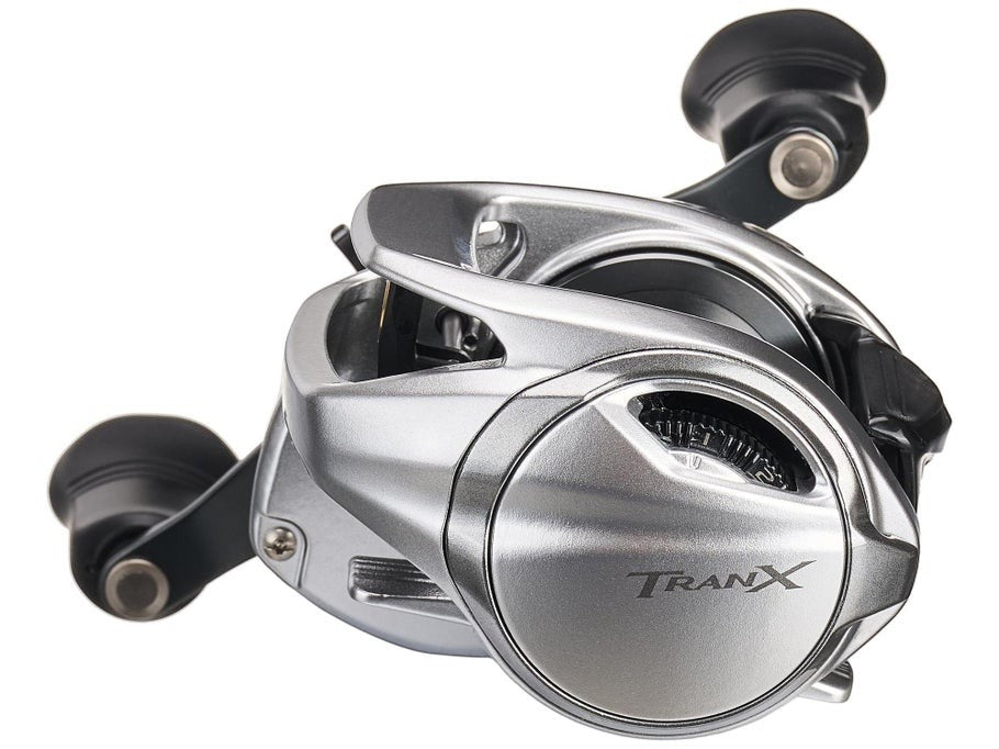 Dogfish Tackle & Marine Shimano Tranx 400 B baitcasting reel, silver aluminum body with black handle and drag knob. Features adjustable dial.
