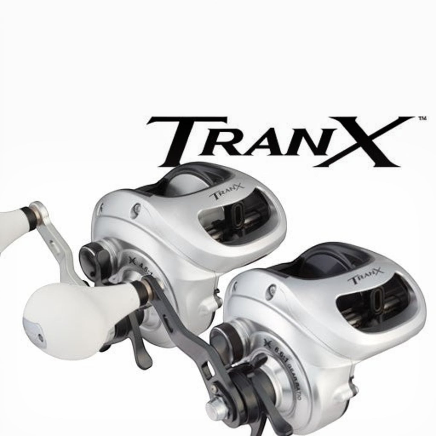 Dogfish Tackle & Marine Shimano Tranx 500 HG/PG silver casting reels with white grips and black accents. Designed for saltwater.