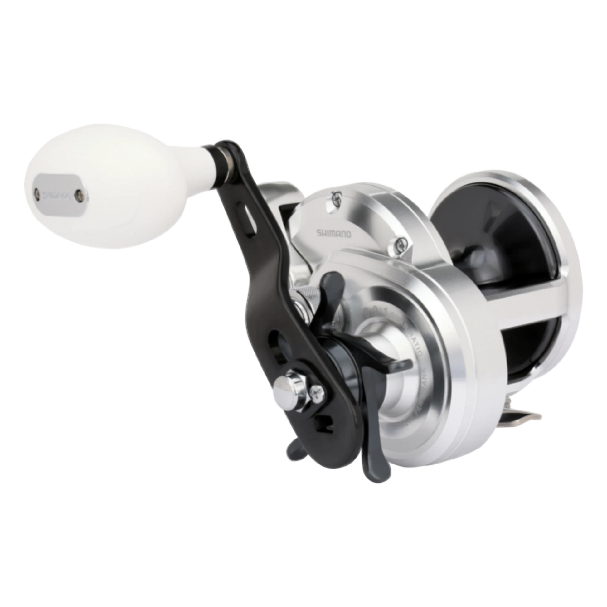 Dogfish Tackle & Marine Shimano Trinidad A conventional fishing reel, silver with black accents and a white handle knob. Features X-Ship and Hagane Body.