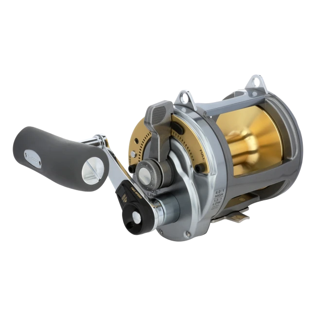 Dogfish Tackle & Marine Shimano Tyrnos 2-Speed fishing reel, silver and gold, with a large black grip on the handle.