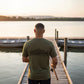 Dogfish Tackle & Marine olive green heather short sleeve t-shirt with skeleton fish graphic on back.