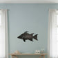 Dogfish Tackle & Marine metal starboard fish wall decor displayed on a light blue wall above a wooden console table.