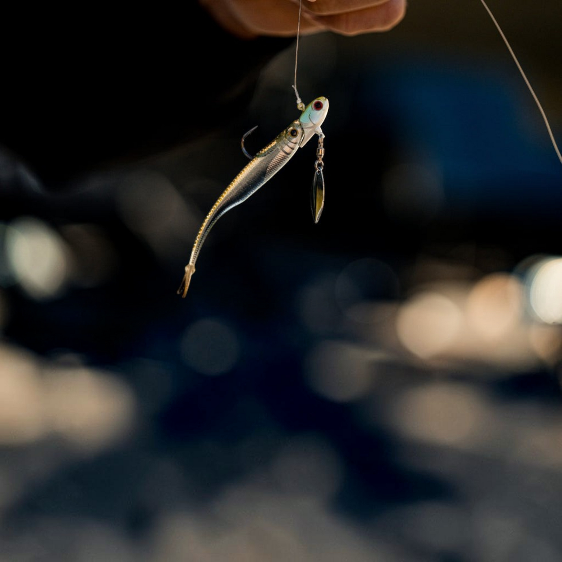 Dogfish Tackle & Marine 6th Sense Strobe Minnow soft plastic bait with realistic 3D eyes and attached spinner blade