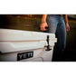 Dogfish Tackle & Marine Yeti Tundra 50 white rotomolded hard cooler being carried by a person in jeans